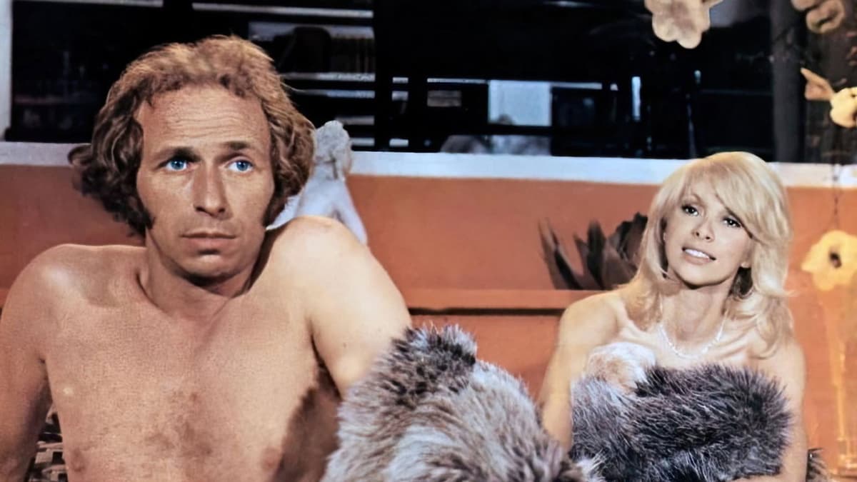Den långe blonde med en svart doja